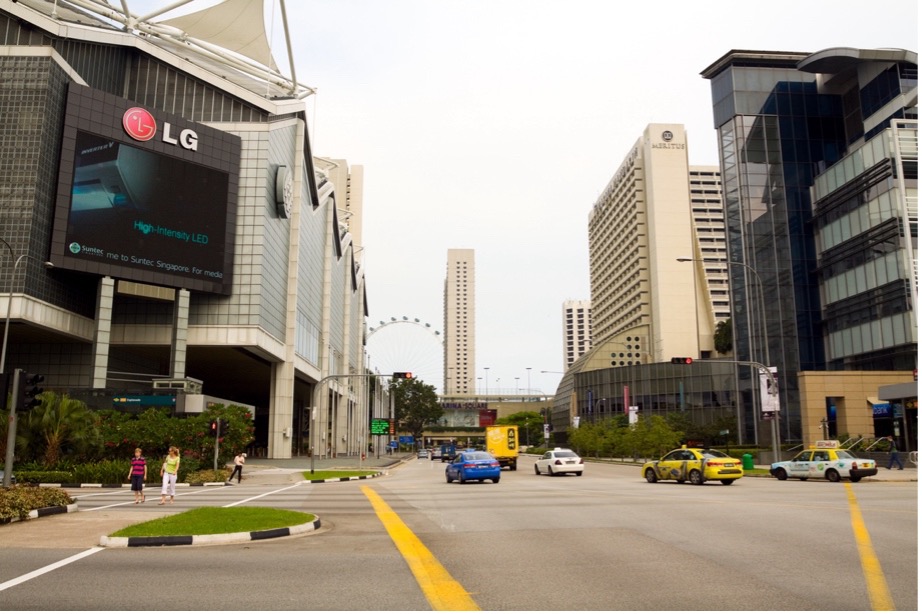 A city street with cars and buildings